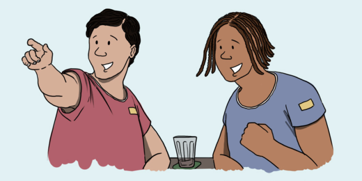 Illustration of two smiling individuals seated at a table. The person on the left, wearing a red shirt, is pointing enthusiastically towards something off-screen, while the person on the right, wearing a blue shirt, is also smiling and appears engaged in the moment. A drinking glass sits on the table between them, suggesting they are in a casual setting. The scene conveys a sense of excitement and positive interaction.